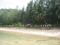 Hua Beach is ringed with trees