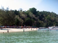 In the afternoon one beach becomes busy with daytrippers on their way back fom Phang Nga Bay
